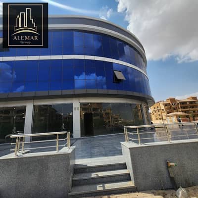 A complete commercial mall for sale in Sheikh Zayed Al-Khamail Al-Mahwar, distinguished commercial center