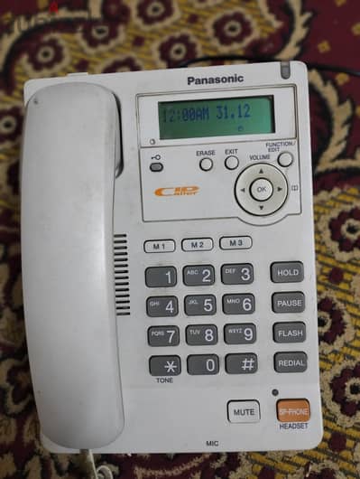 تليفون ارضى باناسونيك ماليزي الصنع يعمل بكفاءة عالية