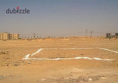 Warehouse land for sale in the industrial area of ​​Fifth Settlement, suitable for logistics warehouses, on the main street, double frontage, area 265