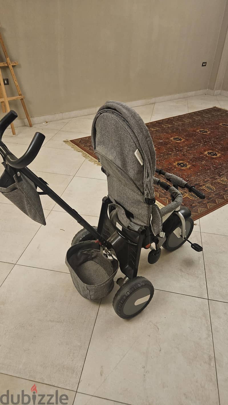 tricycle with a handle to push 1
