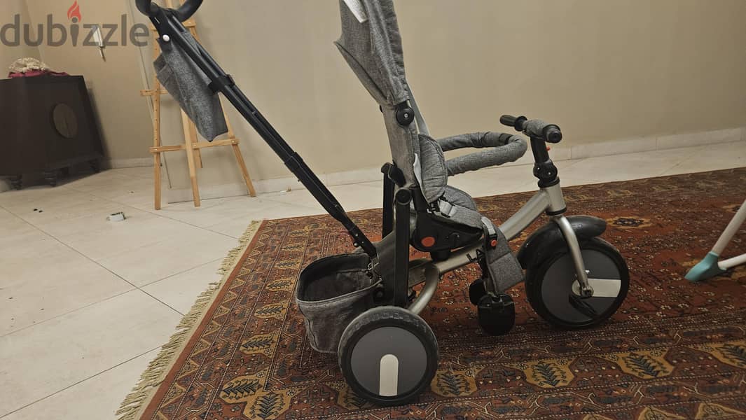 tricycle with a handle to push 2