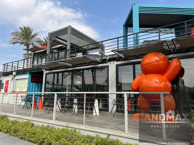 Retail Shop for Rent in Mivida New Cairo with 119 SQM Indoor and 187 SQM Outdoor Area in a Prime Commercial Location