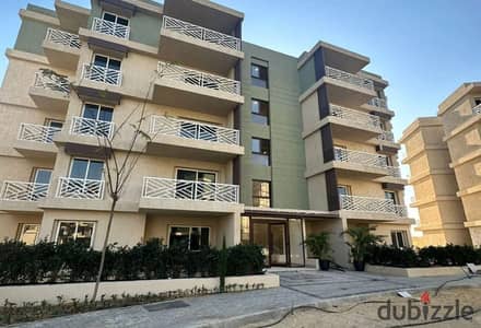 Ground-floor apartment with a garden for sale in Green 6 Compound; immediate delivery, prime location – 6th of October.