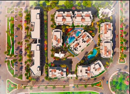  The Best Price per Square Meter on Al Wahat Road – Direct Location!