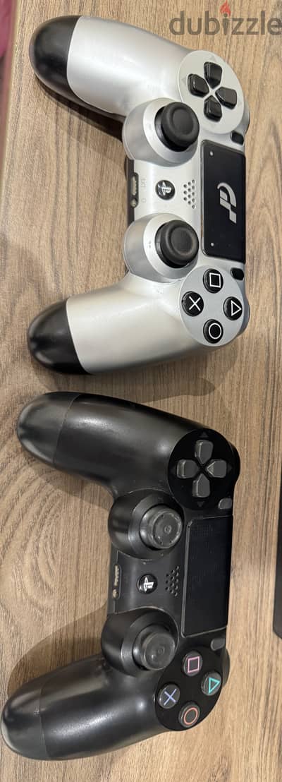 PS4 Pro 1TB used like new - 2 Original Controllers - 11 Great Games