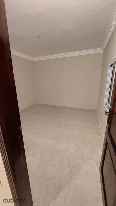 Ground floor apartment with a garden and private entrance for rent in the 10th District - Sheikh Zayed
