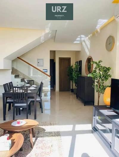 Duplex for sale on a 12year installment plan on the Suez Road next to The Spine Towers and near Fifth Settlement Privado Madinaty and Rehab in Sarai.