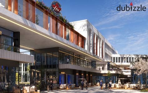 Commercial investment in October Gardens: Ground shop 56m (34+22 outdoor) in Hub Point Mall in front of the fast train with a 5% down payment and an installment of 50 thousand over 7 years and promising returns.