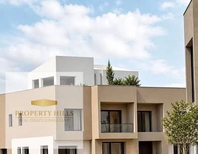 Villa at the price of an apartment, immediate cash (13,500,000) from one of the largest developers, a very high community from the finest compounds, view landscape, villas only, next to the Suez Road, Al-Rehab and Madinaty, minutes from the American University.