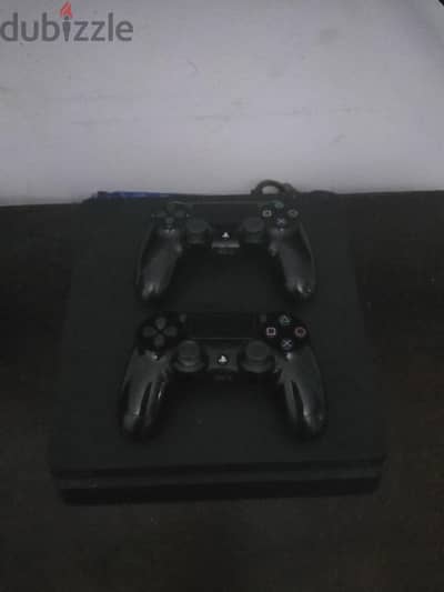playstation 4 slim 1tb+ 2 controllers