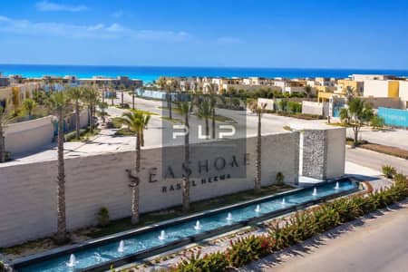Corner chalet for sale, resale, earliest handover, fully finished at sea Shore Hyde Park North Coast with a direct lagoon view
