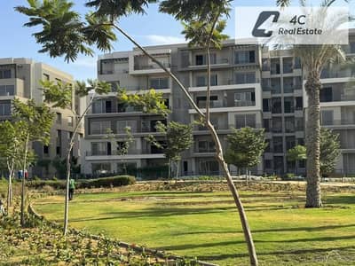 Apartment for sale with installments over 4 years 200 sqm 3 bedrooms prime location open landscape view in Palm Hills New Cairo Fifth Settlement