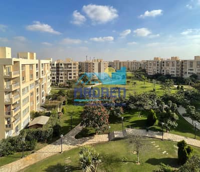 For rent in Madinaty, a 200m apartment in B11 with a wide garden view.