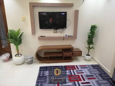 Fully furnished apartment for rent with modern furniture and luxury finishes, fully air-conditioned, in a prime location next to Gate 2, directly oppo