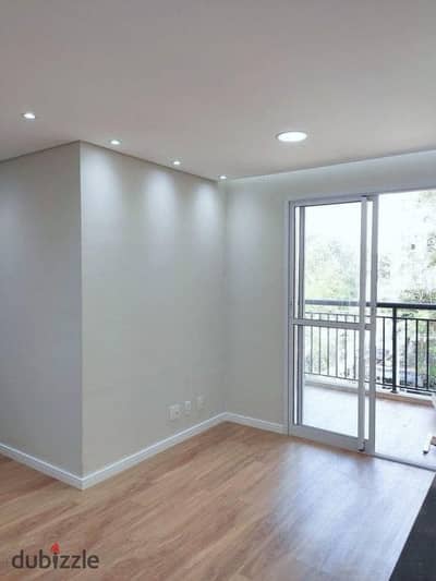 75 sqm studio for sale in Village West Compound (Dorra), Sheikh Zayed City; fully finished and includes air conditioning.
