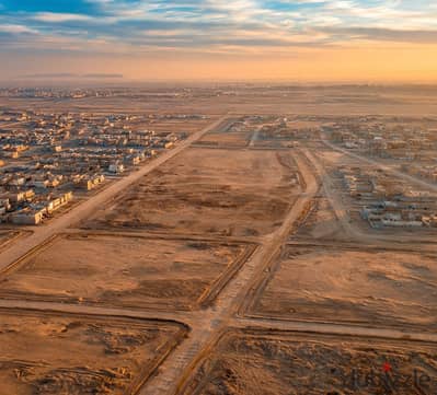 أرض للبيع بالحي 37 حدائق العاشر | 450م واجهة على الرئيسي 45م مباشرة | أمام الخدمات 95 فدان | خالصة وجاهزة للبناء Residential Land For Sale