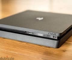playstation 4 slim 1tb+ 2 controllers