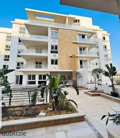 Apartment at half price with a private garden ready for immediate move-in at Mountain View iCity Fifth Settlement (near Palm Hills New Cairo)