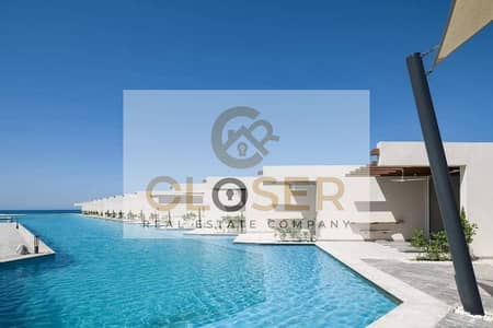 For sale: Fully finished chalet with air conditioning and kitchen, directly on the beach in Ras El Hekma. Delivery within one year.