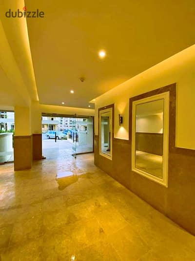 Apartment for sale in New Cairo on the Suez Road next to Madinaty, inside Saray Compound, with a distinctive view of the landscape and a large discoun