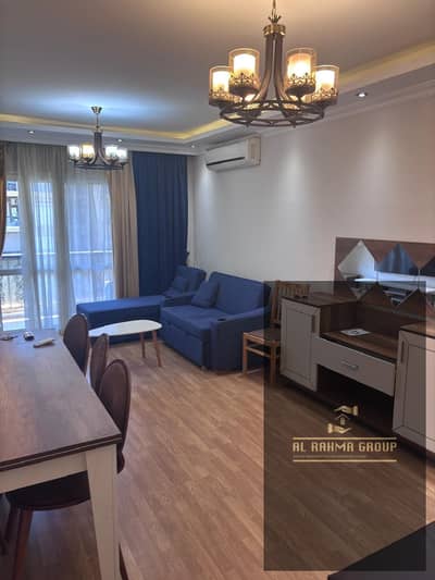 Furnished apartment for rent in Al Rehab, 89 square meters, modern furniture, close to the Eastern Market and Avenue Mall, with a very distinctive vie