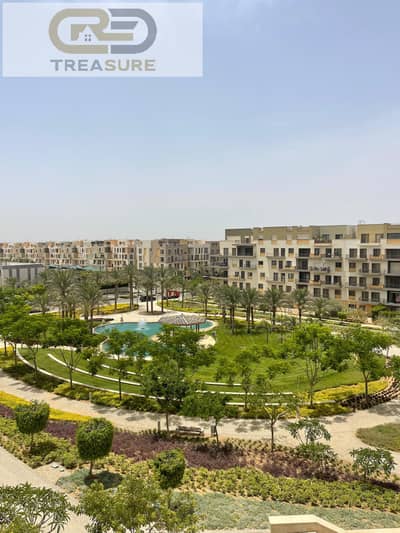 Apartment with garden for sale in Eastown - new cairo