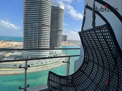 For a quick sale at the old price, a fully finished, ready-to-move-in apartment with air conditioning in Alamein Towers, 156 sq m, double sea and lago