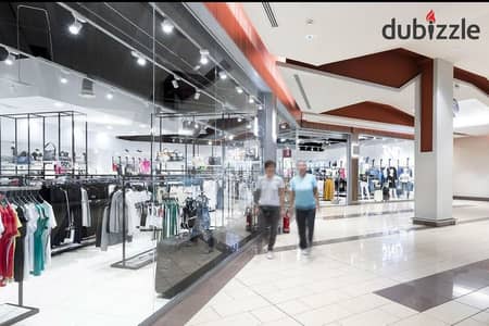 Ground floor shop for sale 30m front on the plaza at a bargain price per meter inside the Walk in Mall in October with a special discount and a 10% down payment and installments for the longest possible period under the supervision and operation of Gll
