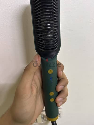 مكواة فرد شعر كهربائية