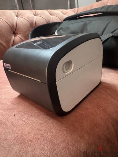 طابعه بواليص جديدة لم يتم استخدماها ومعاها بكرتين  xprinter