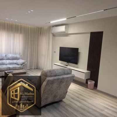 Furnished apartment, first occupancy, in Al Rehab, high-end finishing, available for long-term rental only.