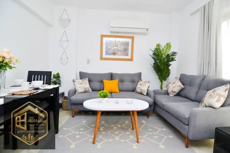 Furnished studio apartment in Al Rehab, first ground floor with garden, opposite services.