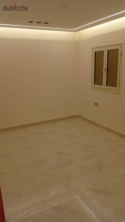 Apartment for rent, new law, family, super lux, first occupancy, Heliopolis, Golf Ground, 2nd floor, stairs, and 3 new painted rooms, near Nabil El-Wakad Street, facade
