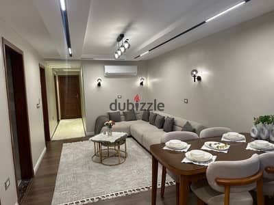 Luxury apartment for sale with furniture, modern tower near Safir Hotel, the area for upscale and distinguished living in Dokki