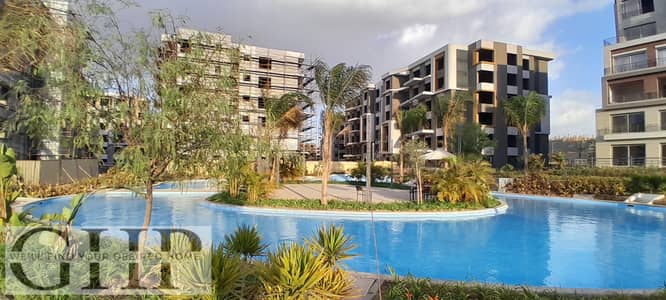 أقل من سعر السوق شقة تشطيب كامل للبيع في بالم هيلز التجمع الخامس Palm Hills New Cairo