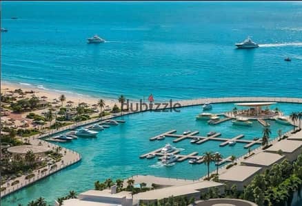 A fully finished chalet featuring a panoramic view of the marina and yacht harbor at Salt, Ras El Hekma