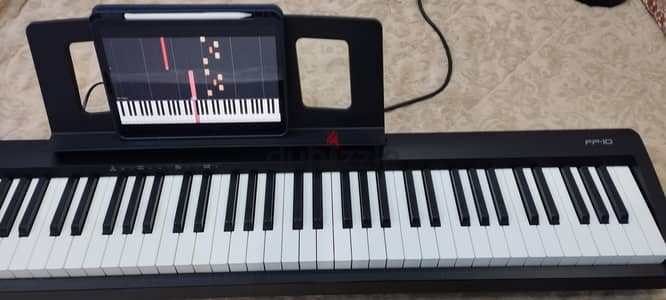 بيانو Roland FP-10 بالكرتونة بجميع القطع بحالة الوكالة