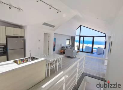 Villa for sale with no down payment, fully furnished and ready to move in—prime location, first row by the sea at Makadi Heights, Hurghada.