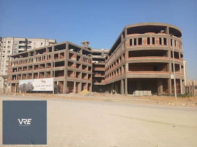 Own a commercial shop 69 meters +27 meters external area featuring a distinctive location in front of Wadi Degla Club