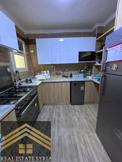 Apartment without furniture, just a kitchen, Dar Masr, with a zero kitchen, special finishes, area 130 meters, 3 rooms and 2 bathrooms, fifth floor, first phase, overlooking a garden and Green Hills Club, special finishing
