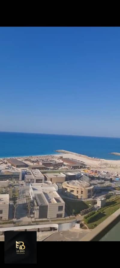شقة للبيع بالدور 13 بـ Sea View وشاملة الجراج في كمبوند The Gate Tower - Alamein