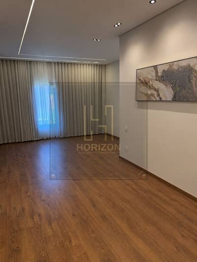 Semi furnished with appliances Studio sale The Village Palm Hills New Cairo