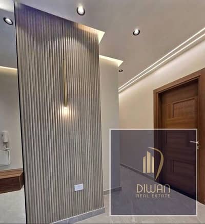 Ready-to-move, fully finished apartment, prime location on Suez Road, New Cairo. Minutes to AUC, open view of green spaces.