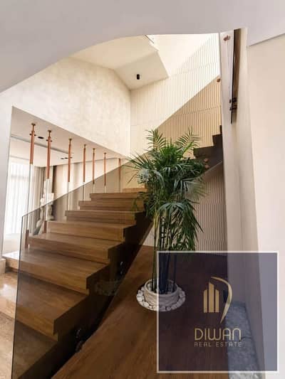 Twin house villa for sale—fully finished with A/C  and ready to move . Located directly opposite Cairo International Airport in the Taj City compound,