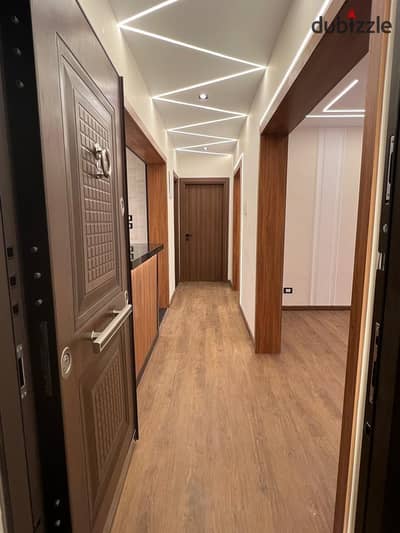For sale in Al-Rehab, a ground-floor apartment with a private garden, super luxury finishing, first occupancy, and ready for immediate living.