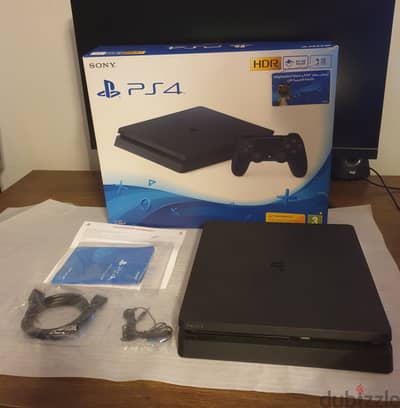 PS4 Slim 1TB – Excellent condition