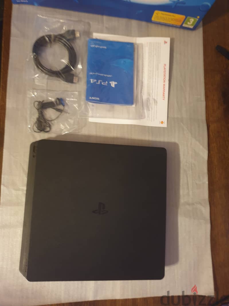 PS4 Slim 1TB – Excellent condition 1