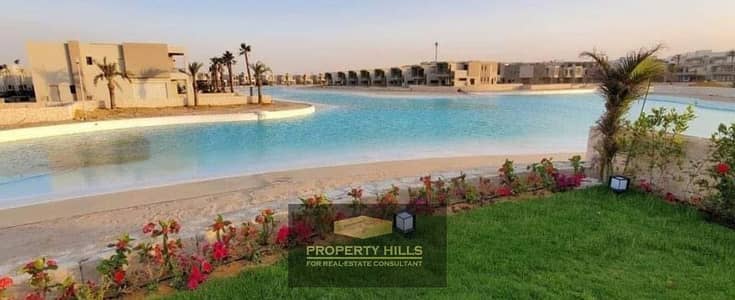 فيلا للبيع متشطبه علي البحر ب ازها الساحل الشمالي بجانب رامله مراكز