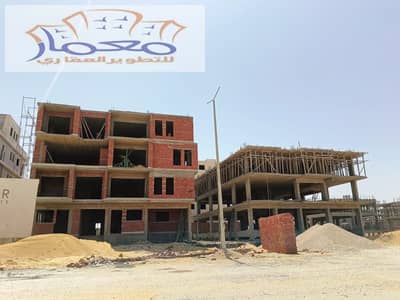 A luxury apartment for sale in the finest location in Beit Al-Watan, Fifth Settlement + the apartment has a garden, completely paid, immediate delivery
