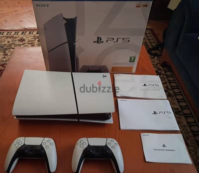 PS5 Slim CD Edition with 2 controllers and 10 Games